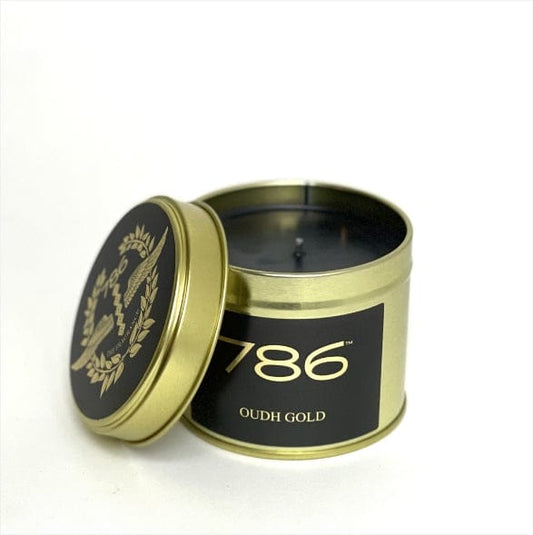 Oudh gold candle in a tin