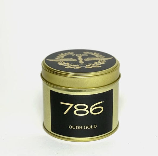 Oudh gold candle in a tin
